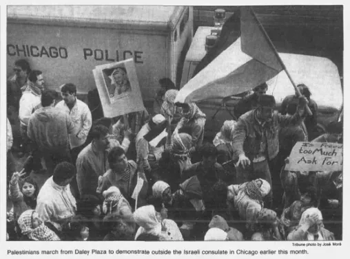 Palestinians march from Daley Plaza to demonstrate outside the Israeli consulate in Chicago — Chicago Tribune, 28 April 1988