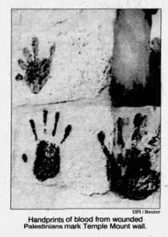 Handprints of blood from wounded Palestinians mark Temple Mount wall &mdash; Newsday, 11 October 1990