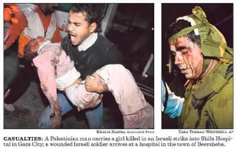 CASUALTIES: A Palestinian man carries a girl killed in an Israeli strike into Shifa Hospital in Gaza City; a wounded Israeli soldier arrives at a hospital in Beersheba &mdash; Los Angeles Times, 6 January 2009