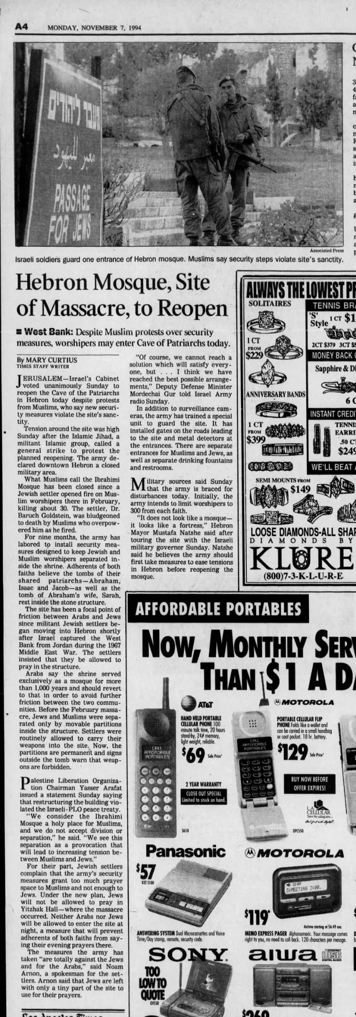 A sign reading Passage for Jews at the Hebron mosque site &mdash; Los Angeles Times, 7 November 1994