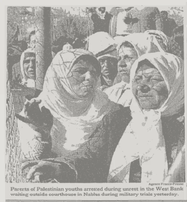 Parents of Palestinian youths arrested during unrest in the West Bank waiting outside the courthouse in Nablus during military trials — The New York Times, 29 December 1987