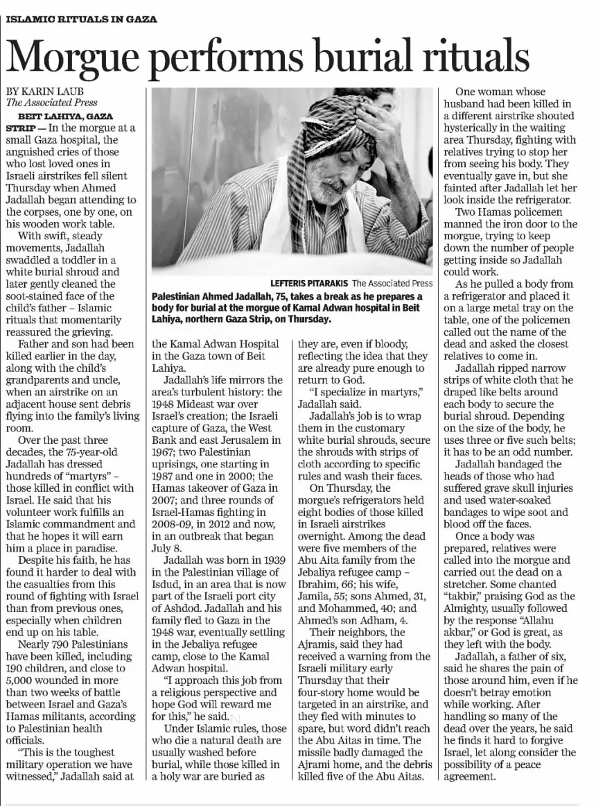 Morgue performs burial rituals &mdash; The Olympian, 25 July 2014