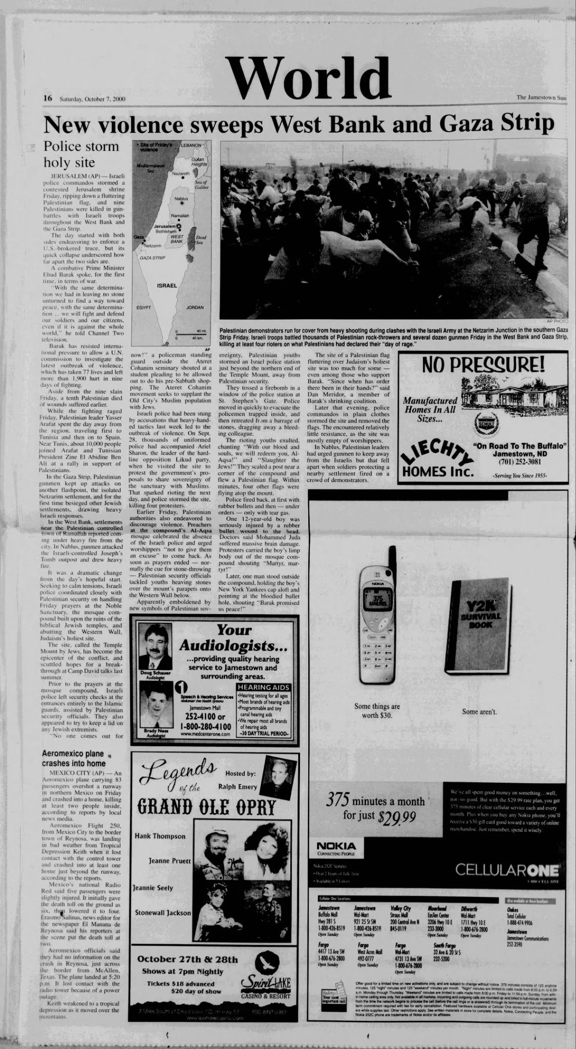 World &mdash; The Courier News, 7 October 2000