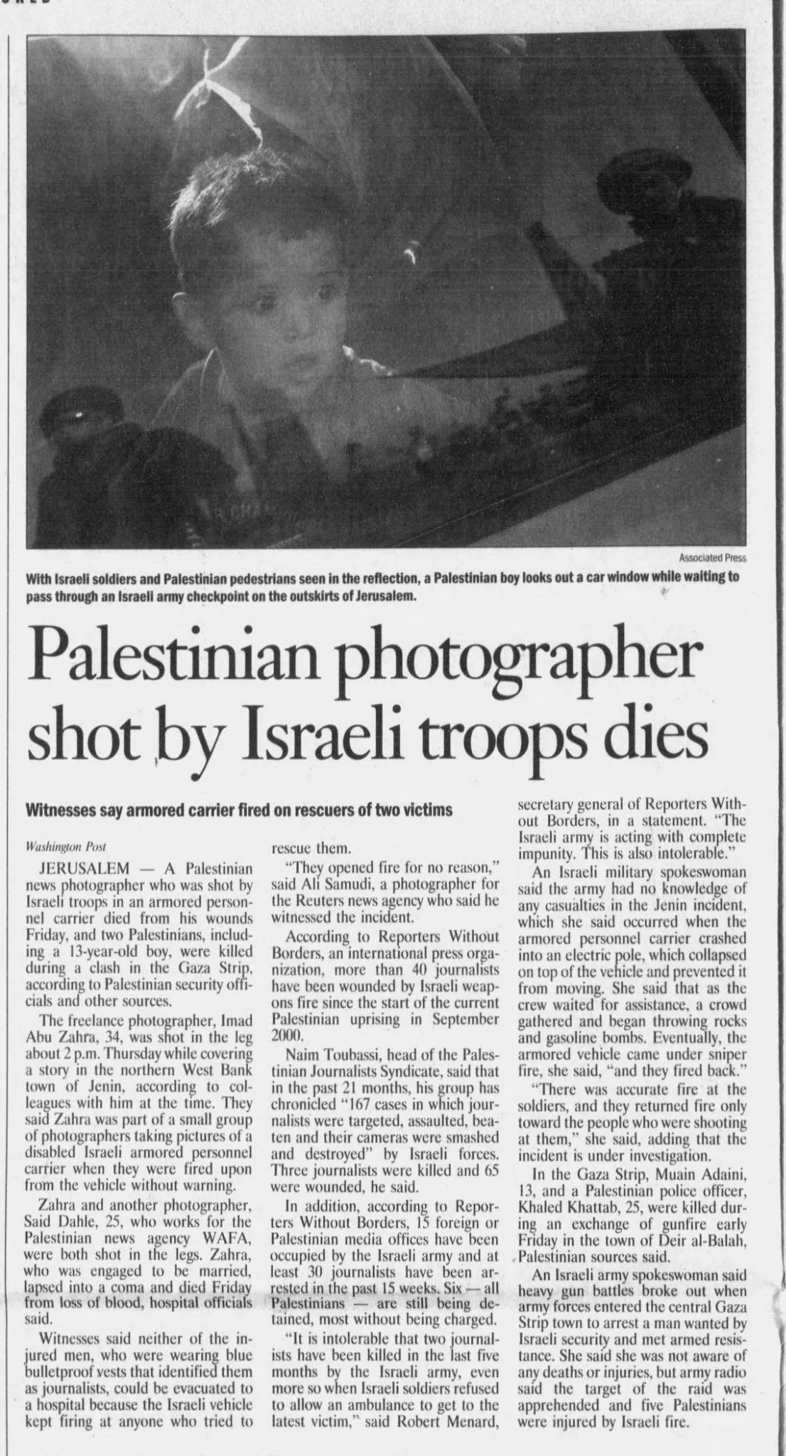 Palestinian photographer shot by Israeli troops dies &mdash; The Spokesman-Review, 13 July 2002