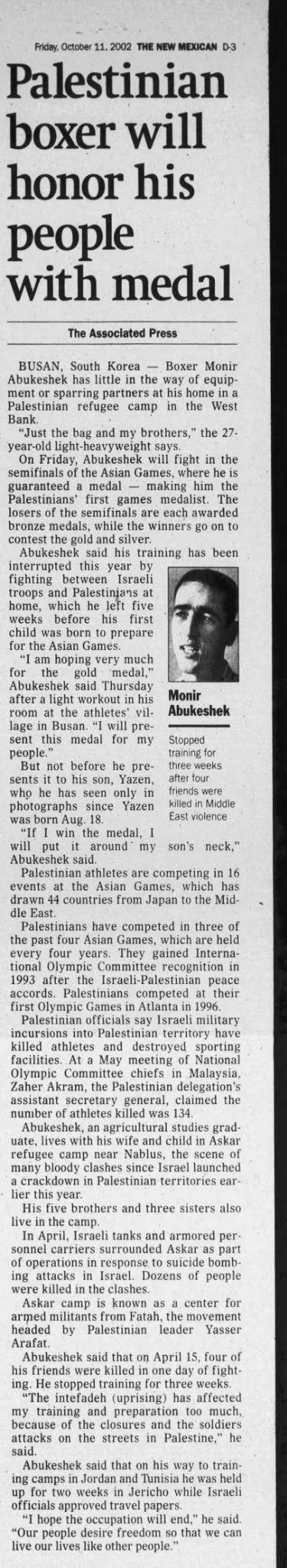 Palestinian boxer will honor his people with medal &mdash; The New Mexican, 11 October 2002